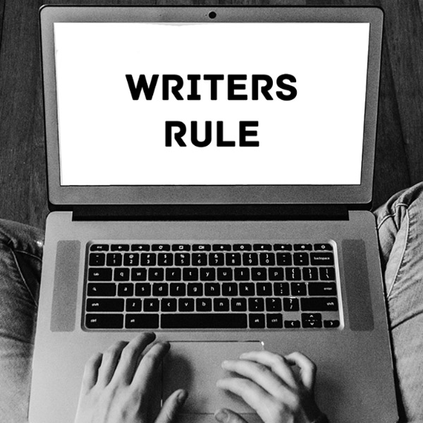 Laptop with "Writers Rule" on the screen