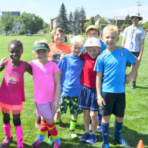 Youths and instruction at summer Youth Sport Camp